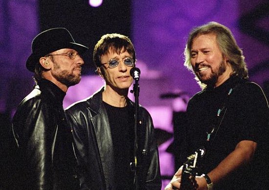 Bee Gee Barry Gibb says his dead brothers have appeared to him